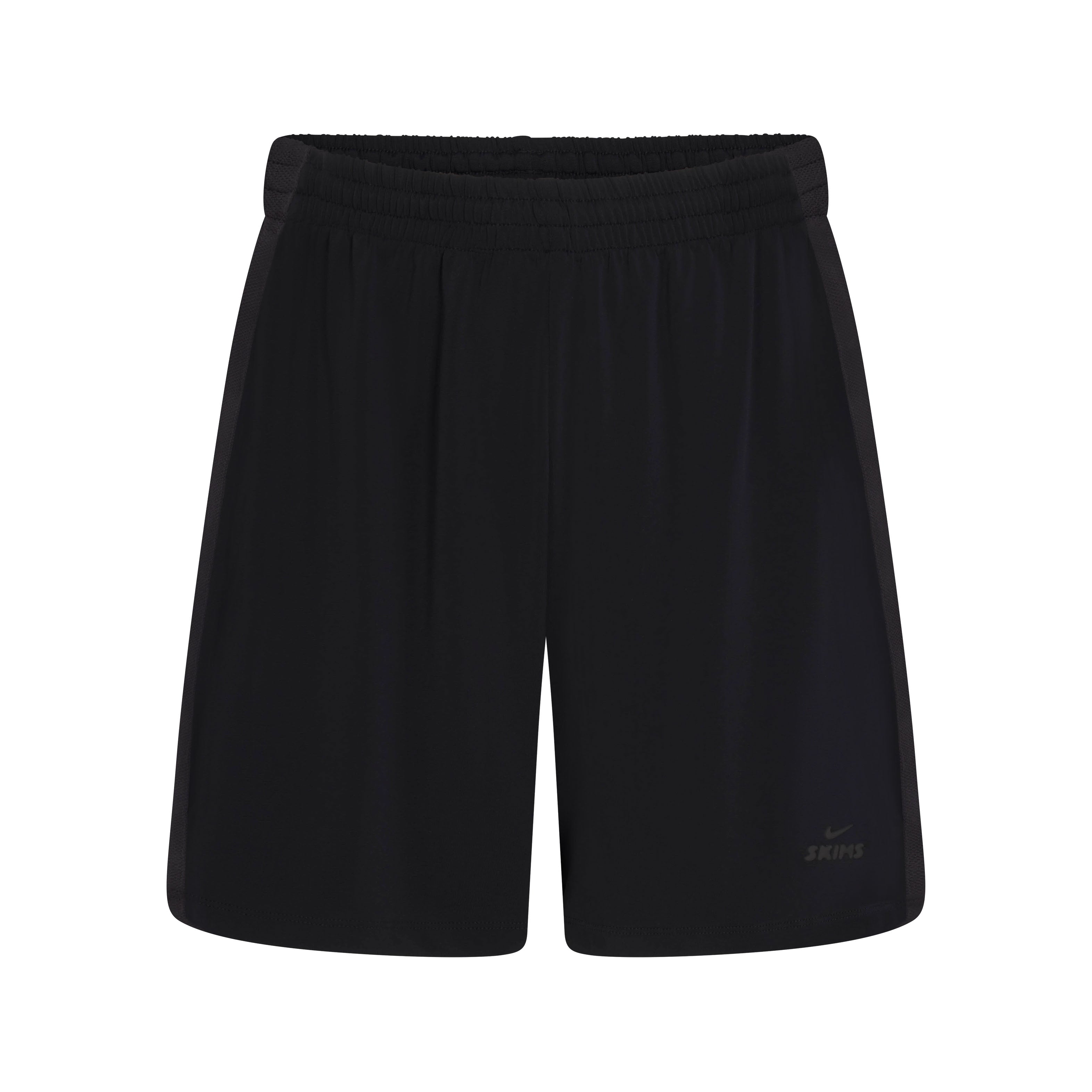 NikeSKIMS STRETCH KNIT DOLPHIN SHORT | NSKM OBSIDIAN/NSKM IGNEOUS FLAT ON A WHITE BACKGROUND | FLT