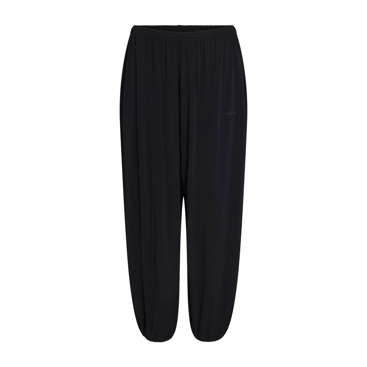 NikeSKIMS STRETCH KNIT HAREM PANT | NSKM OBSIDIAN/NSKM IGNEOUS FLAT ON A WHITE BACKGROUND | FLT