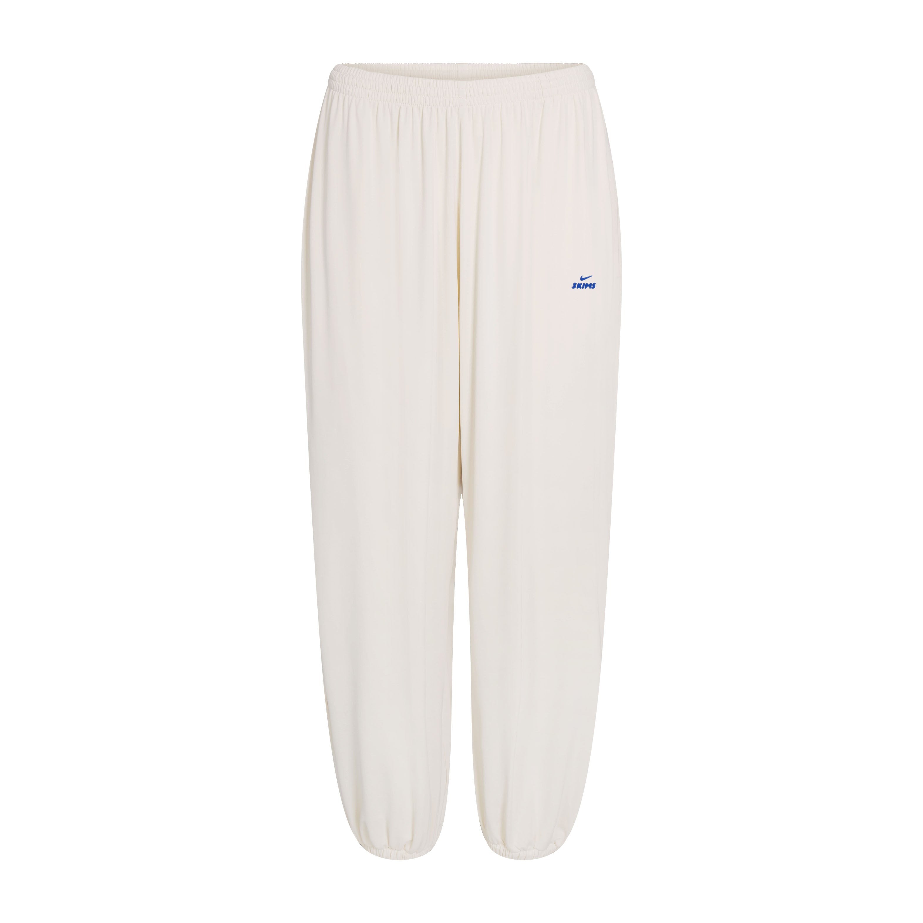 NikeSKIMS STRETCH KNIT HAREM PANT | NSKM ACTV IVORY/NSKM COBALT FLAT ON A WHITE BACKGROUND | FLT