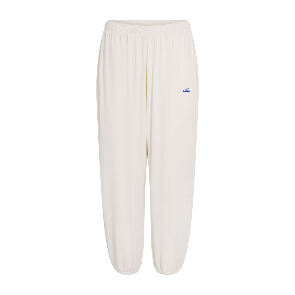 NikeSKIMS STRETCH KNIT HAREM PANT | NSKM ACTV IVORY/NSKM COBALT FLAT ON A WHITE BACKGROUND | FLT