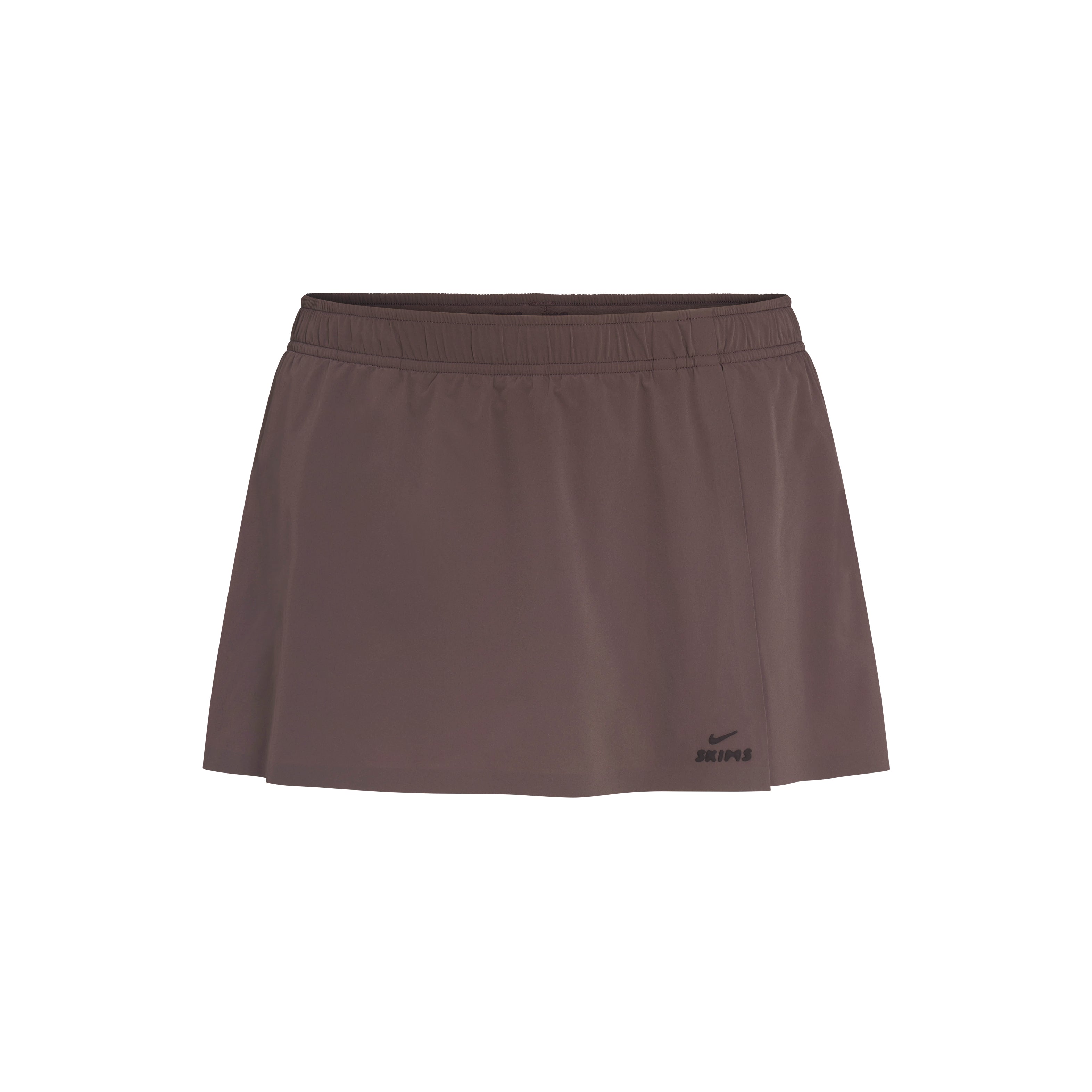 NikeSKIMS STRETCH NYLON FRONT FLAP SKORT | NSKM RESIN FLAT ON A WHITE BACKGROUND | FLT