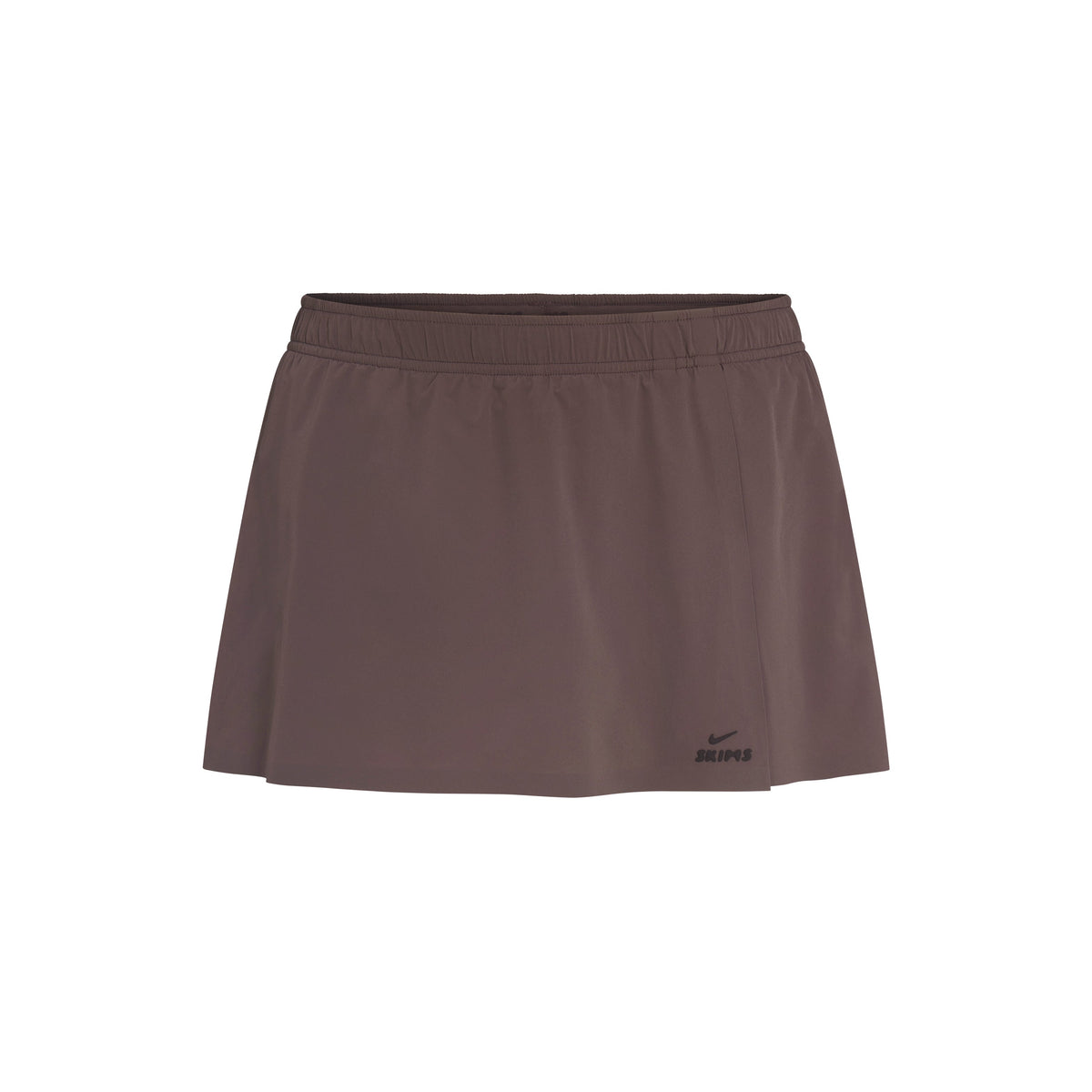 NikeSKIMS STRETCH NYLON FRONT FLAP SKORT | NSKM RESIN FLAT ON A WHITE BACKGROUND | FLT