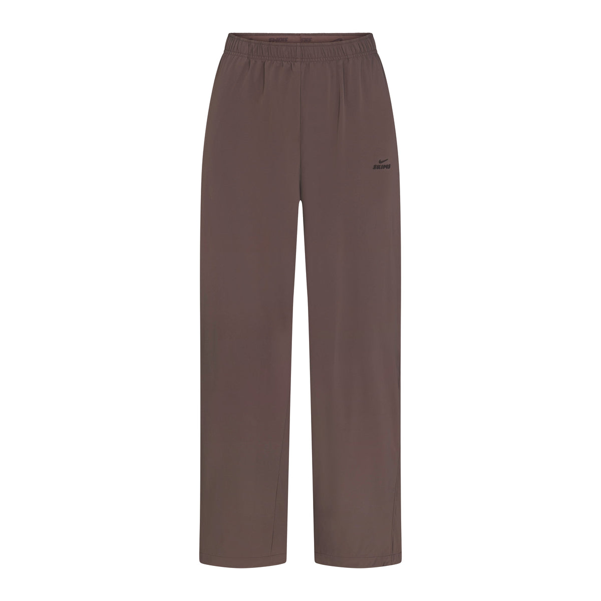 NikeSKIMS STRETCH NYLON OVERSIZED PANT | NSKM RESIN FLAT ON A WHITE BACKGROUND | FLT