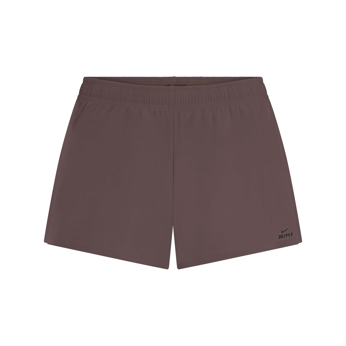 NikeSKIMS STRETCH NYLON RUNNER SHORT | NSKM RESIN FLAT ON A WHITE BACKGROUND | FLT