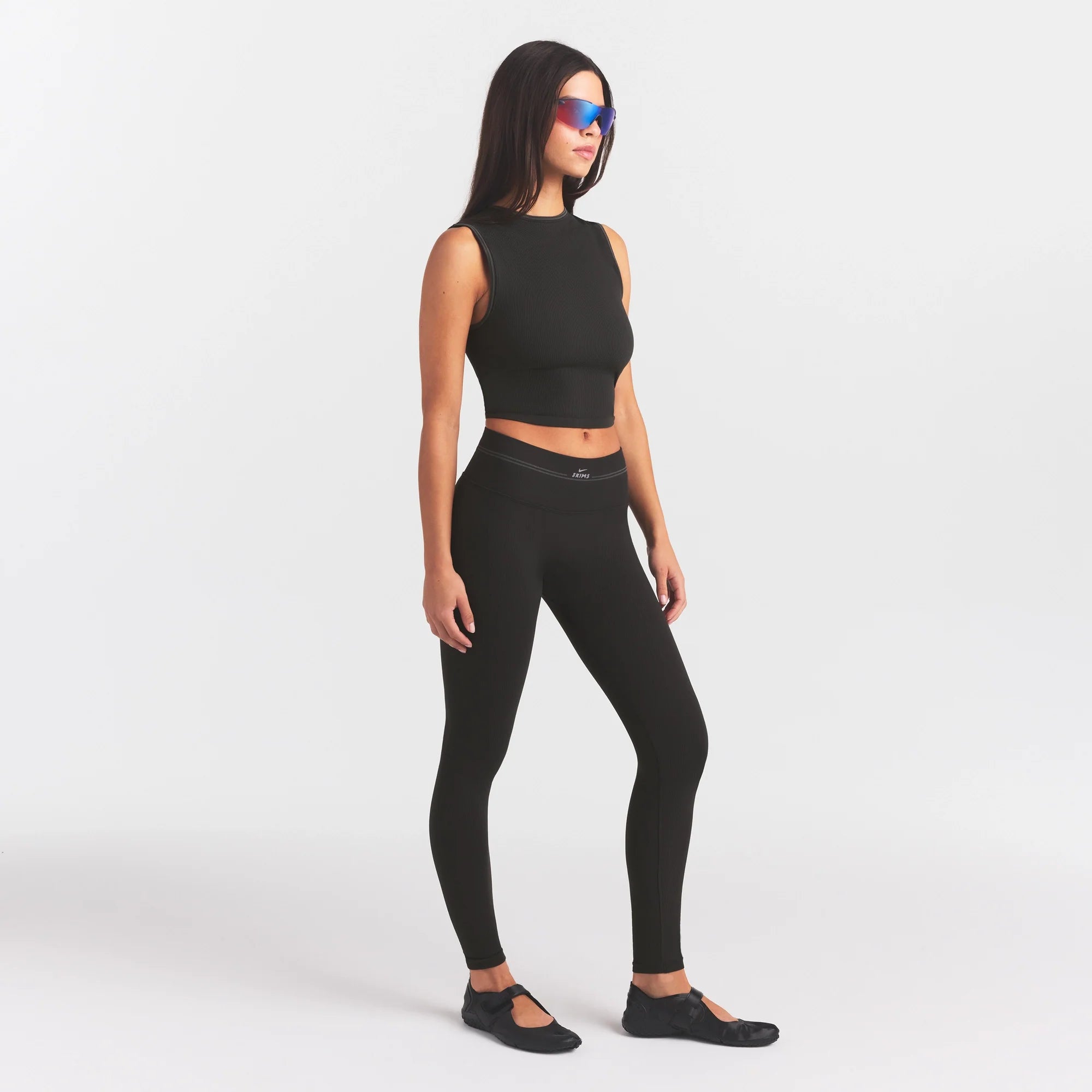 NikeSKIMS RIBBED SEAMLESS 26" LEGGING | OBSIDIAN ON A MODEL FRONT VIEW