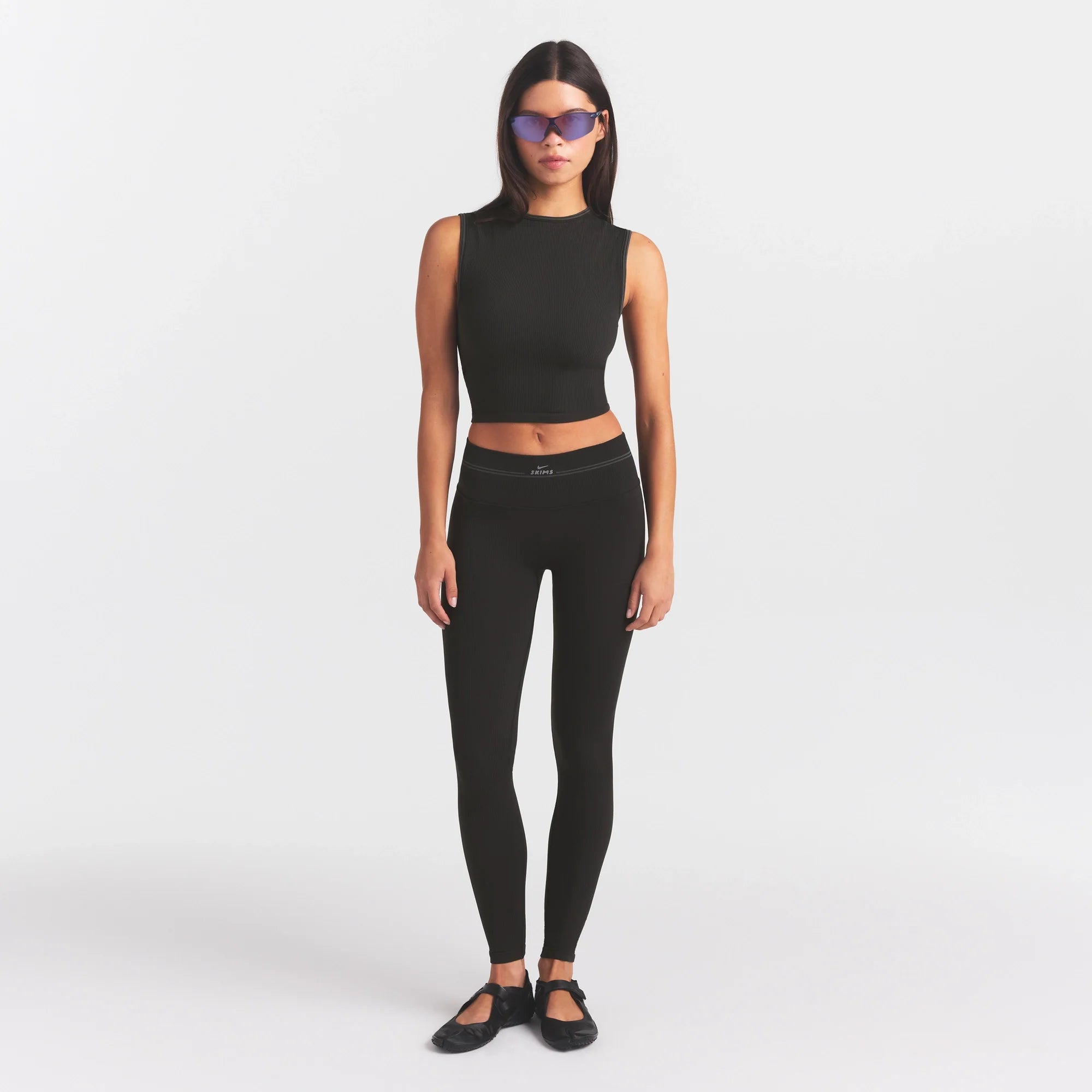 NikeSKIMS RIBBED SEAMLESS 26" LEGGING | OBSIDIAN ON A MODEL FRONT VIEW