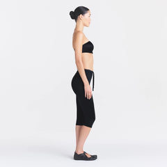 NikeSKIMS SATIN SHINE CAPRI 17" LEGGING | OBSIDIAN ON A MODEL FRONT VIEW