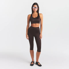 NikeSKIMS SATIN SHINE CAPRI 17" LEGGING | PHOENIX ON A MODEL FRONT VIEW