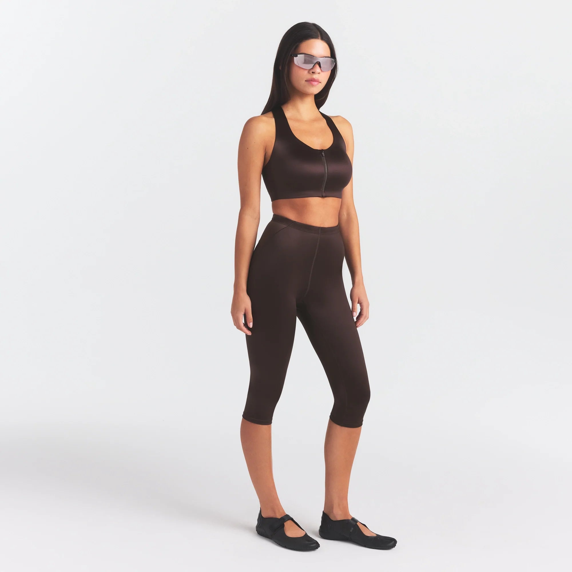 NikeSKIMS SATIN SHINE CAPRI 17" LEGGING | PHOENIX ON A MODEL FRONT VIEW