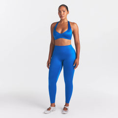 NikeSKIMS SATIN SHINE BONDED WAIST LEGGING 26" | COBALT ON A MODEL FRONT VIEW