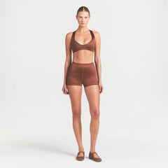 NikeSKIMS SATIN SHINE DRAWCORD 2" SHORT | CAROB BROWN ON A MODEL FRONT VIEW @ | FOCUS: 0.0, 1.0, 0.9