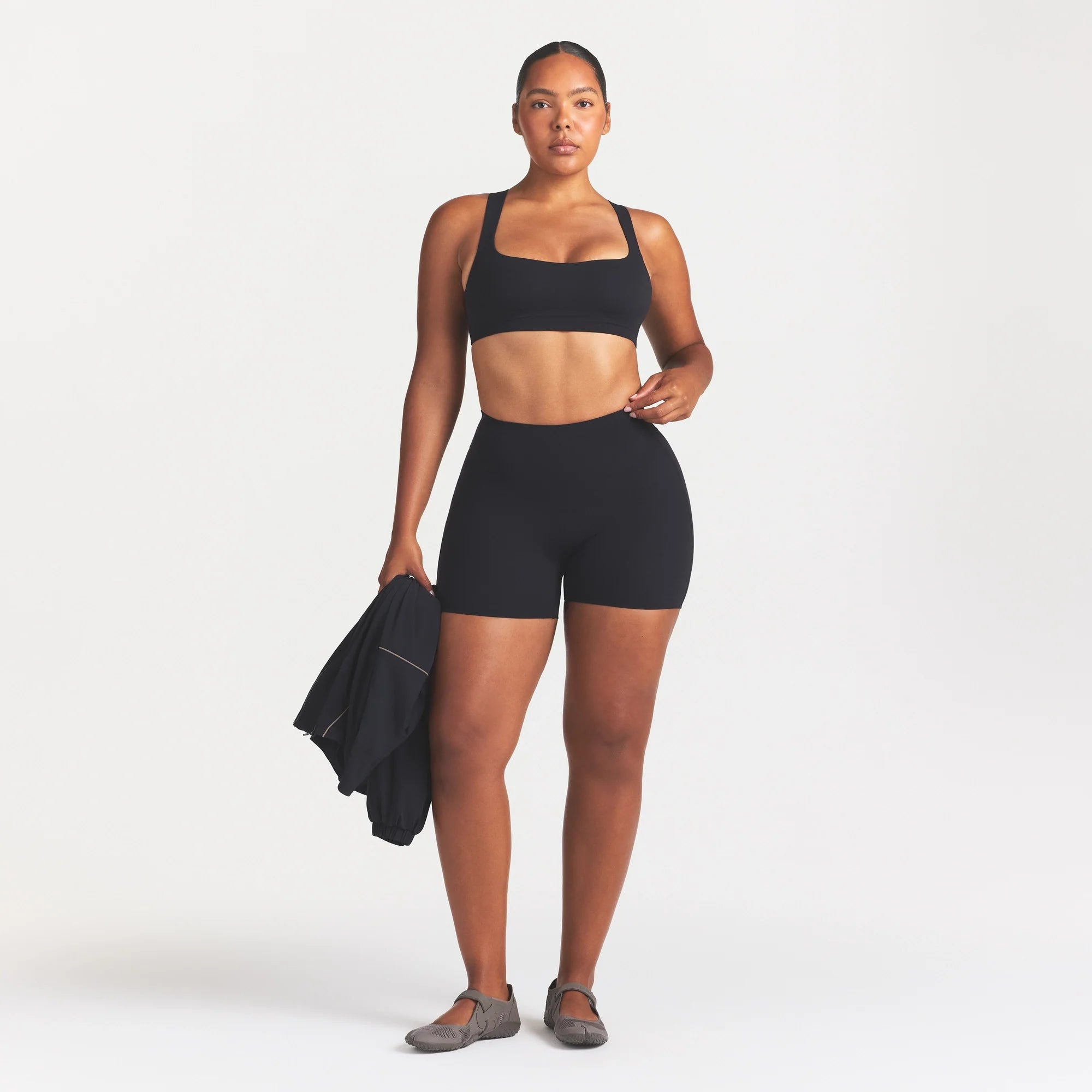 NikeSKIMS STUDIO STRETCH 5" BIKER SHORT | OBSIDIAN ON A MODEL FRONT VIEW @ | FOCUS: 0.0, 1.0, 0.9