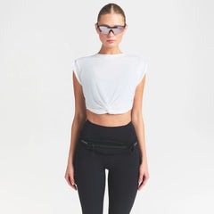 NikeSKIMS PERFORMANCE COTTON BLEND CROP TWIST TANK | SNOW & LAYS FLAT ON A WHITE BACKGROUND | FLT