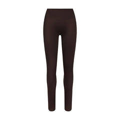 NikeSKIMS SATIN SHINE BONDED WAIST LEGGING 29 INCH | NSKM PHOENIX FLAT ON A WHITE BACKGROUND | FLT