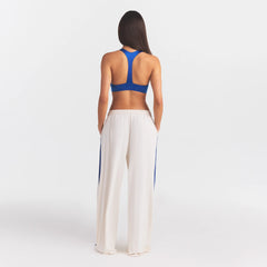 NikeSKIMS STRETCH KNIT WIDE LEG PANT | IVORY ON A MODEL FRONT VIEW @ | FOCUS: 0.0, 1.0, 0.9