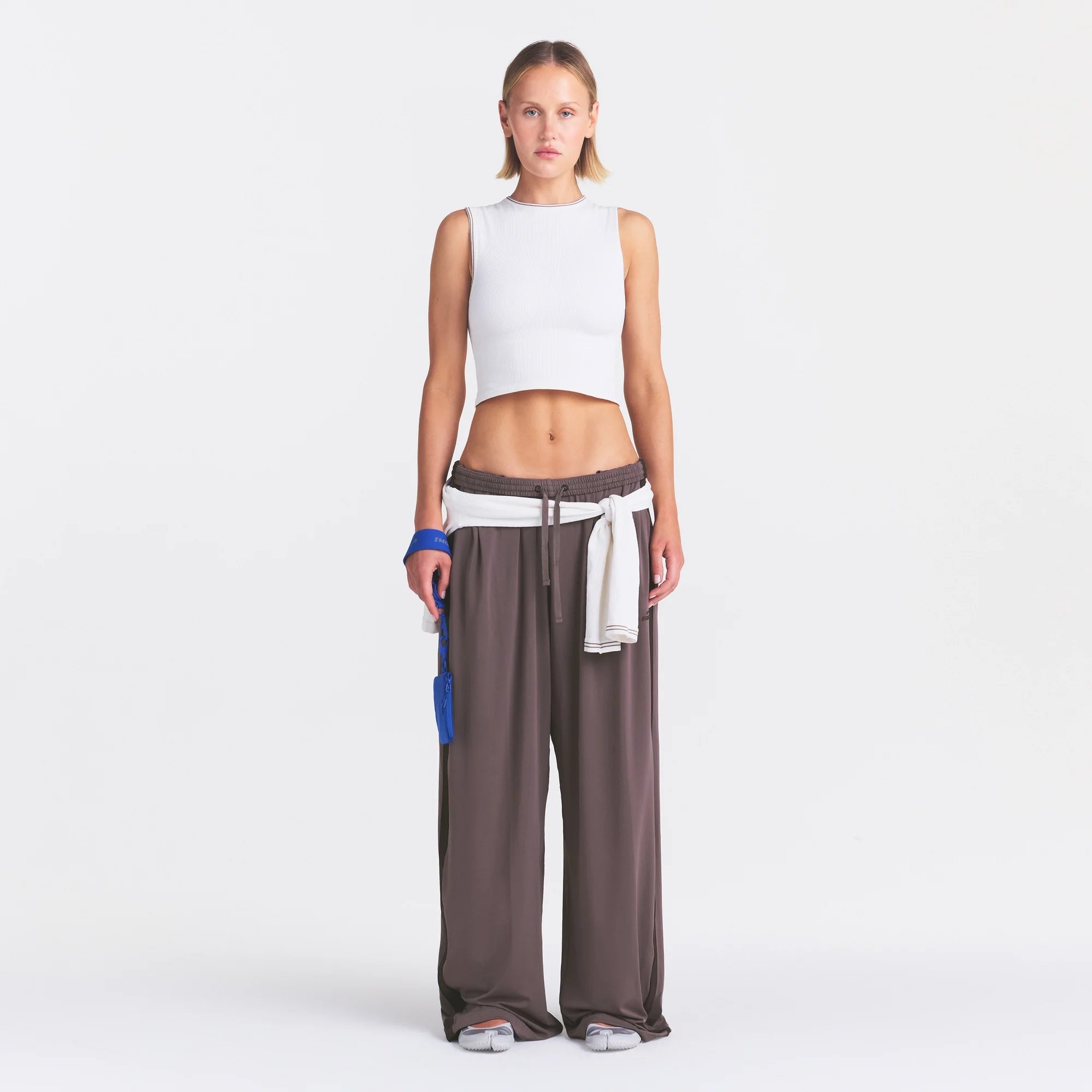 NikeSKIMS STRETCH KNIT WIDE LEG PANT | RESIN ON A MODEL FRONT VIEW @ | FOCUS: 0.0, 1.0, 0.9