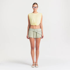 NikeSKIMS STRETCH NYLON SKORT | TALC ON A MODEL FRONT VIEW @ | FOCUS: 0.0, 1.0, 0.9