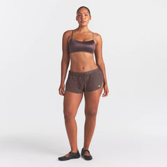 NikeSKIMS STRETCH NYLON RUNNER SHORT | RESIN ON A MODEL FRONT VIEW @ | FOCUS: 0.0, 1.0, 0.9