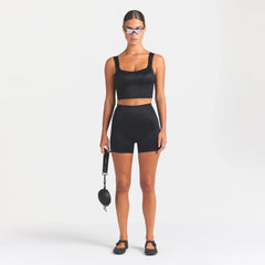 NikeSKIMS SATIN SHINE PANELED 5” BIKER SHORT | OBSIDIAN ON A MODEL FRONT VIEW @ | FOCUS: 0.0, 1.0, 0.9