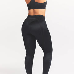 NikeSKIMS SATIN SHINE PANELED 26” LEGGING | OBSIDIAN ON A MODEL SIDE VIEW @ | FOCUS: 0.0, 1.0, 0.9