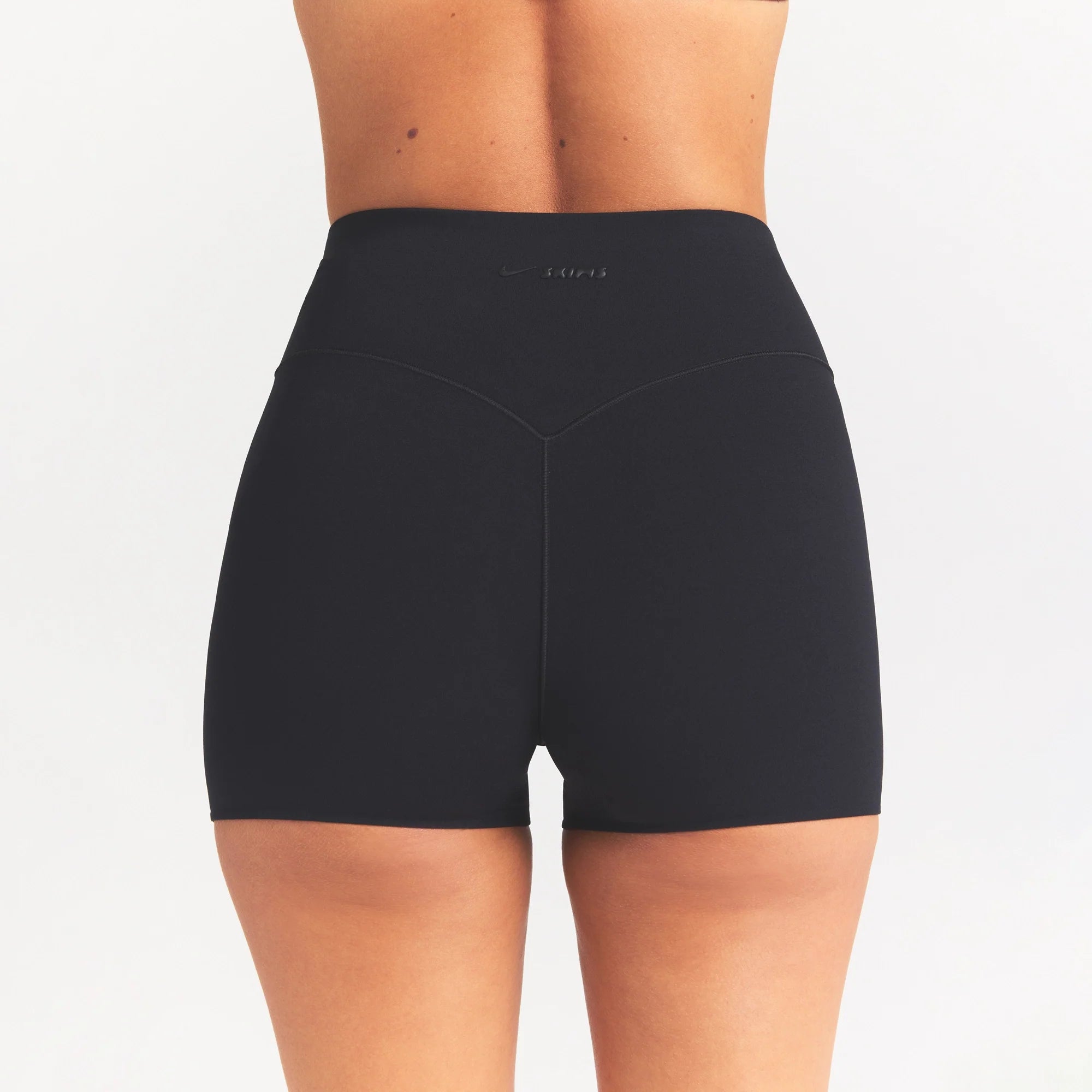 NikeSKIMS STUDIO STRETCH 3" SHORT | OBSIDIAN ON A MODEL SIDE VIEW