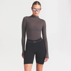 NikeSKIMS WEIGHTLESS LAYERS MOCK NECK LONG SLEEVE TOP | BOULDER ON A MODEL FRONT VIEW @ | FOCUS: 0.0, 1.0, 0.9
