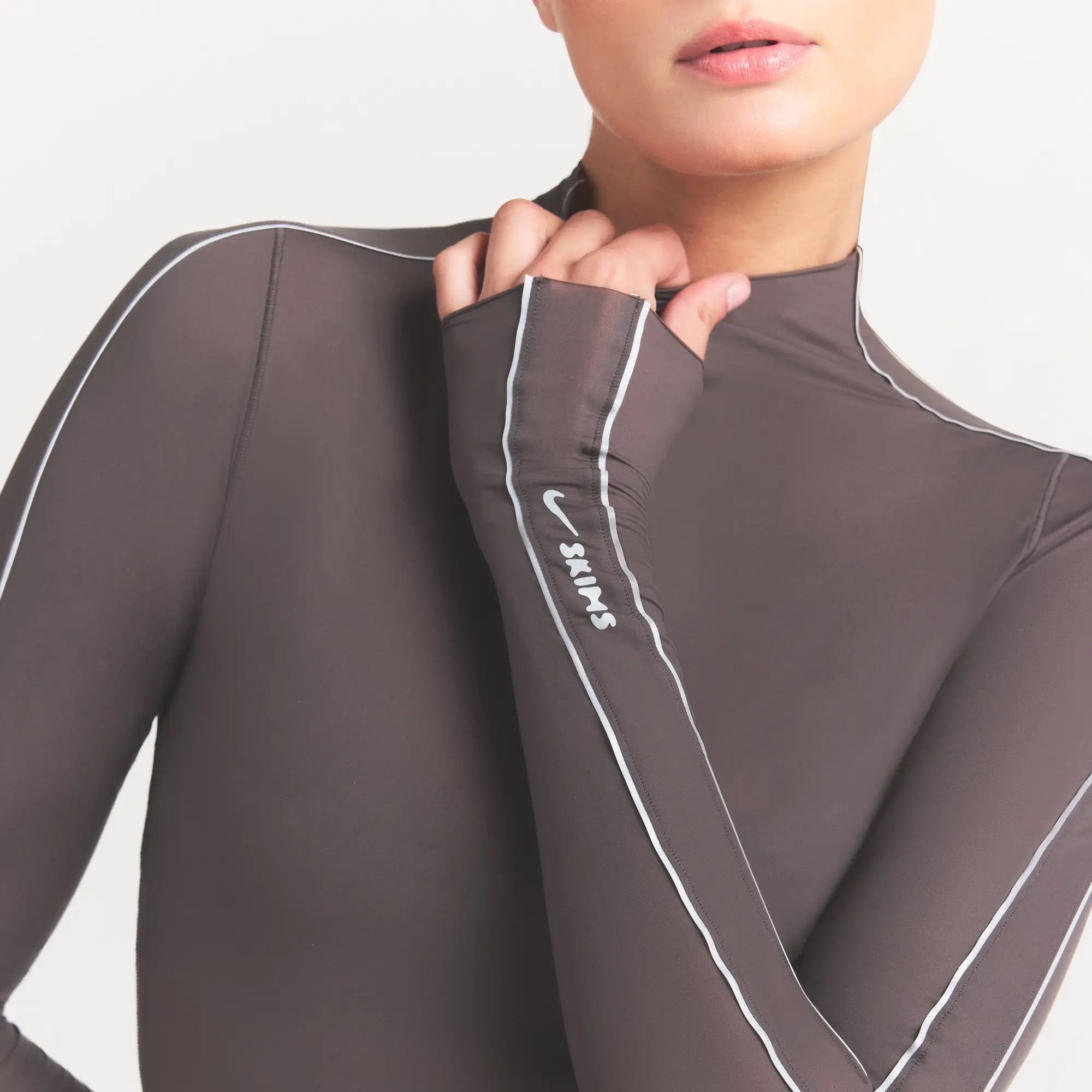 NikeSKIMS WEIGHTLESS LAYERS MOCK NECK LONG SLEEVE TOP | BOULDER ON A MODEL SIDE VIEW @ | FOCUS: 0.0, 1.0, 0.9