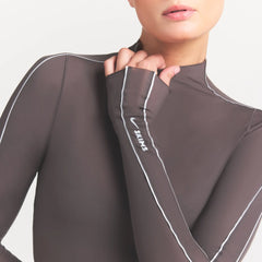 NikeSKIMS WEIGHTLESS LAYERS MOCK NECK LONG SLEEVE TOP | BOULDER ON A MODEL SIDE VIEW @ | FOCUS: 0.0, 1.0, 0.9