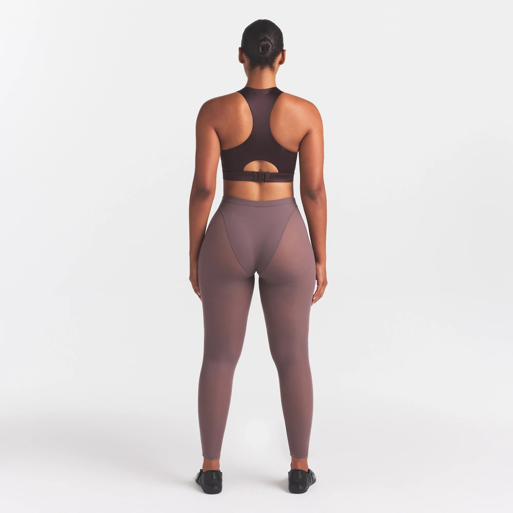 NikeSKIMS SATIN SHINE HIGH NECK BRA | PHOENIX ON A MODEL FRONT VIEW @ | FOCUS: 0.0, 1.0, 0.9