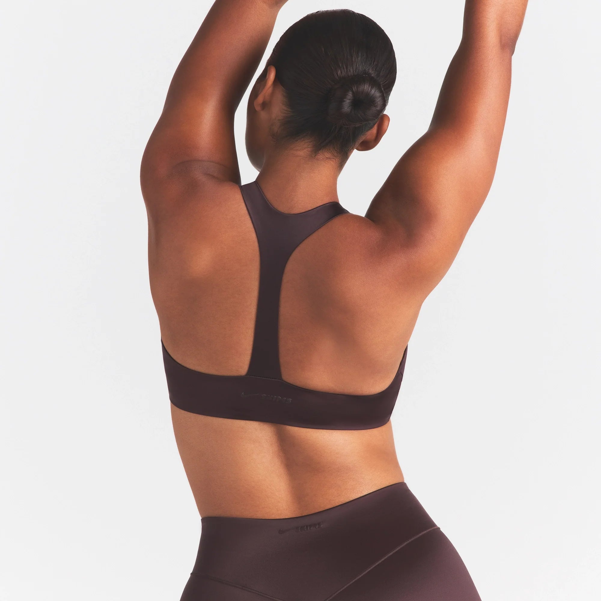 NikeSKIMS SATIN SHINE PLUNGE T-BACK BRA | PHOENIX ON A MODEL SIDE VIEW @ | FOCUS: 0.0, 1.0, 0.9
