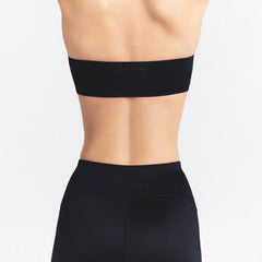NikeSKIMS SATIN SHINE BANDEAU BRA | OBSIDIAN ON A MODEL SIDE VIEW @ | FOCUS: 0.0, 1.0, 0.9