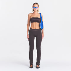 NikeSKIMS SATIN SHINE BANDEAU BRA | PHOENIX ON A MODEL FRONT VIEW @ | FOCUS: 0.0, 1.0, 0.9