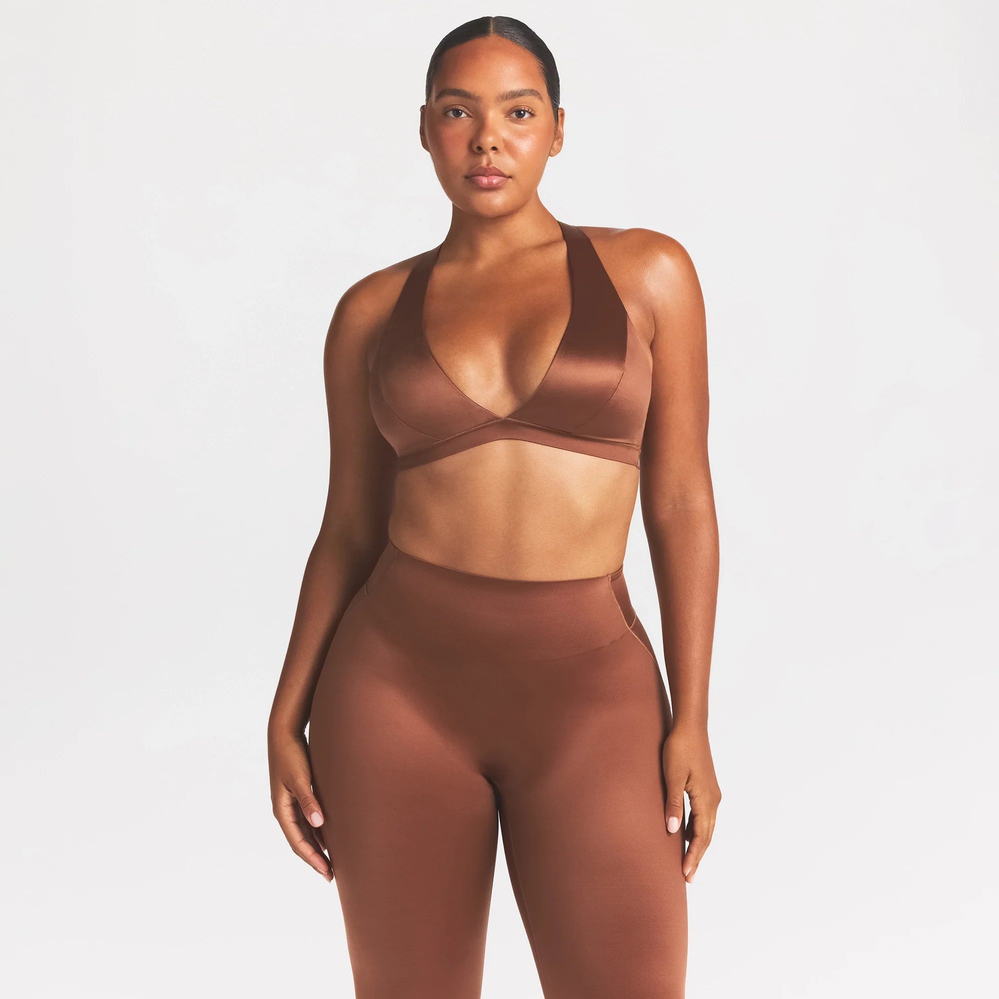 NikeSKIMS SATIN SHINE RACERBACK BRA | CAROB BROWN ON A MODEL SIDE VIEW @ | FOCUS: 0.0, 1.0, 0.9