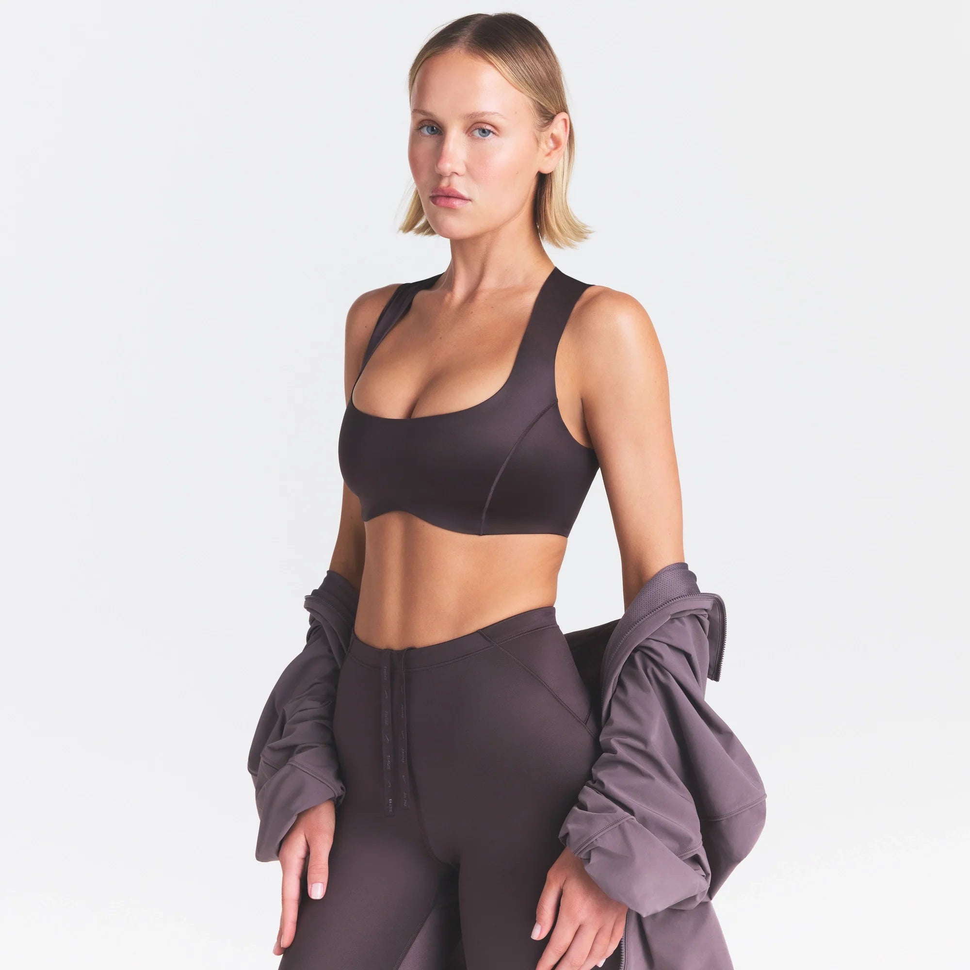 NikeSKIMS SATIN SHINE WIDE SCOOP BRA | PHOENIX ON A MODEL SIDE VIEW @ | FOCUS: 0.0, 1.0, 0.9