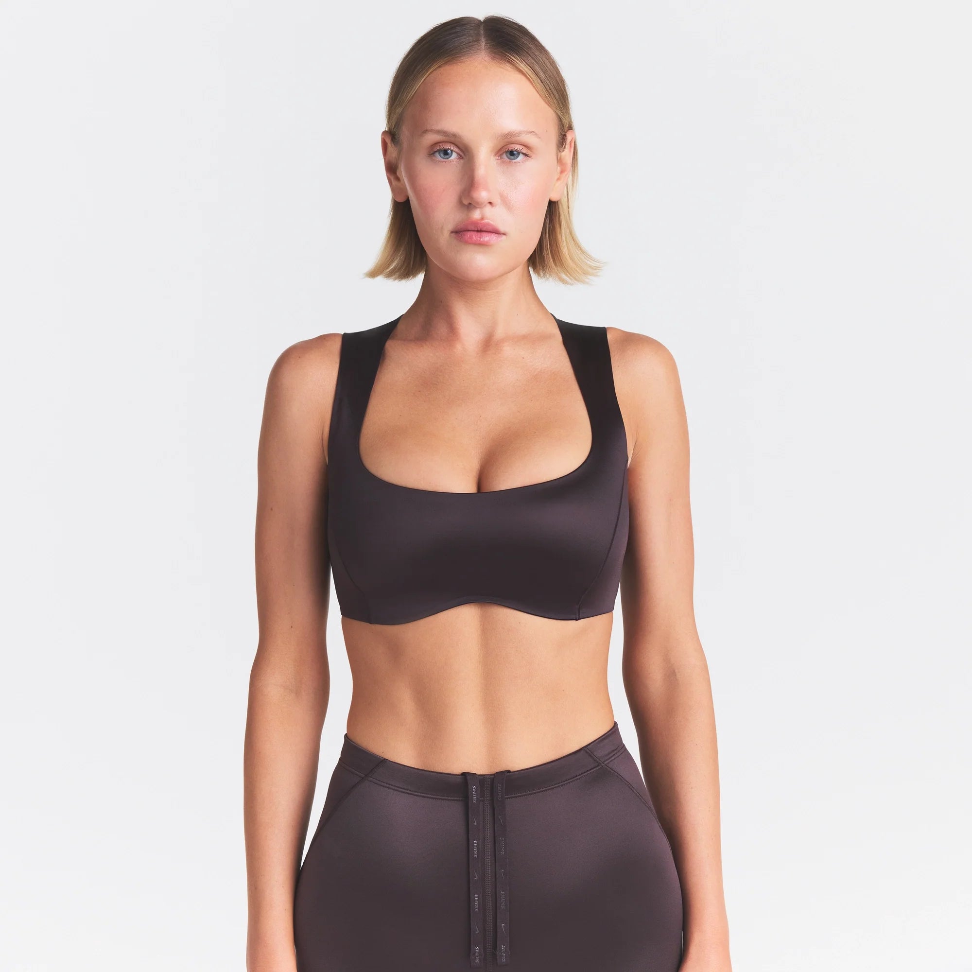 NikeSKIMS SATIN SHINE WIDE SCOOP BRA | PHOENIX ON A MODEL SIDE VIEW @ | FOCUS: 0.0, 1.0, 0.9