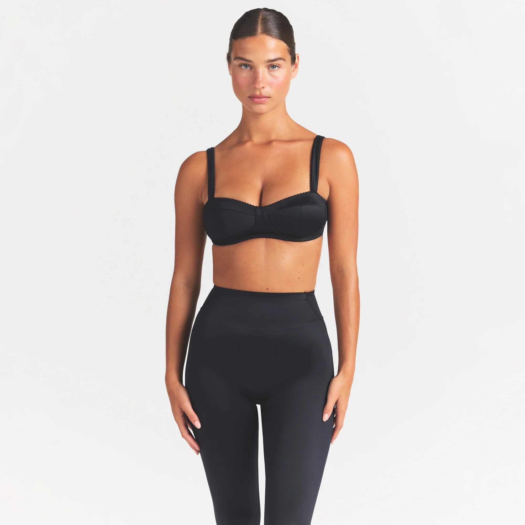 NikeSKIMS SATIN SHINE PANELED PICOT BRA | OBSIDIAN ON A MODEL SIDE VIEW @ | FOCUS: 0.0, 1.0, 0.9