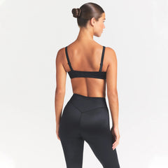 NikeSKIMS SATIN SHINE PANELED PICOT BRA | OBSIDIAN ON A MODEL SIDE VIEW @ | FOCUS: 0.0, 1.0, 0.9