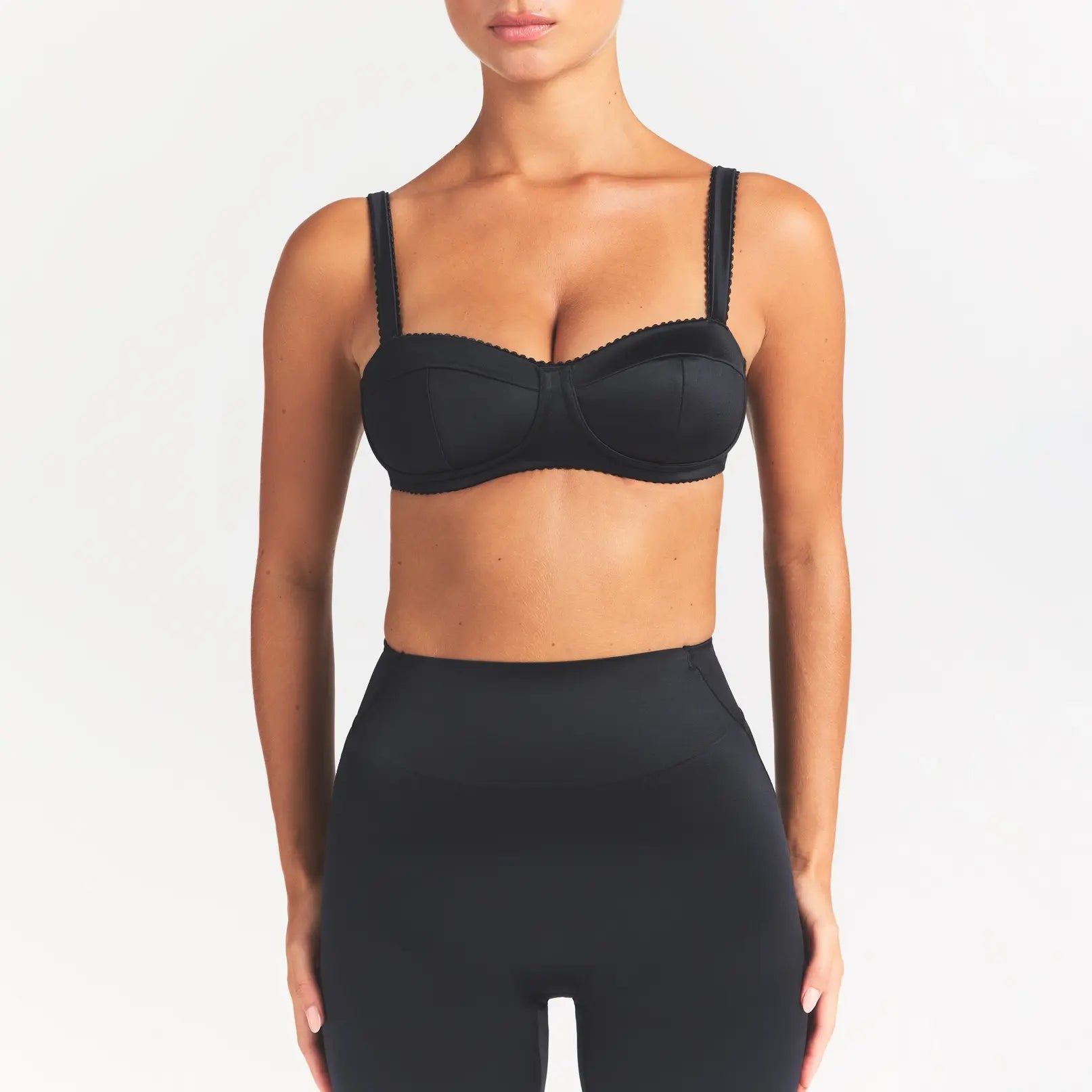 NikeSKIMS SATIN SHINE PANELED PICOT BRA | OBSIDIAN ON A MODEL SIDE VIEW @ | FOCUS: 0.0, 1.0, 0.9