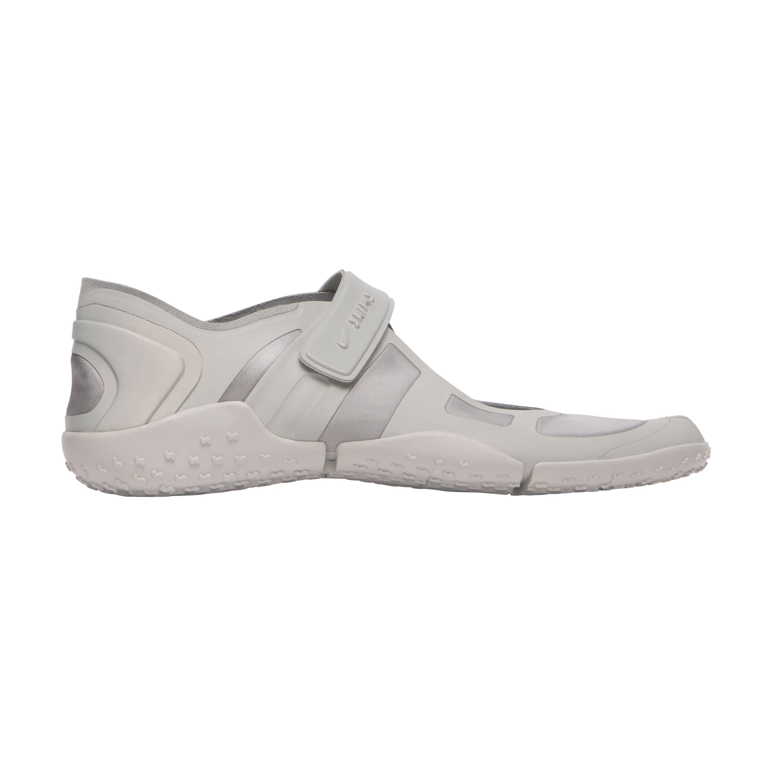 NikeSKIMS FOOTWEAR RIFT SATIN | LT BONE FLAT ON A WHITE BACKGROUND | FLT