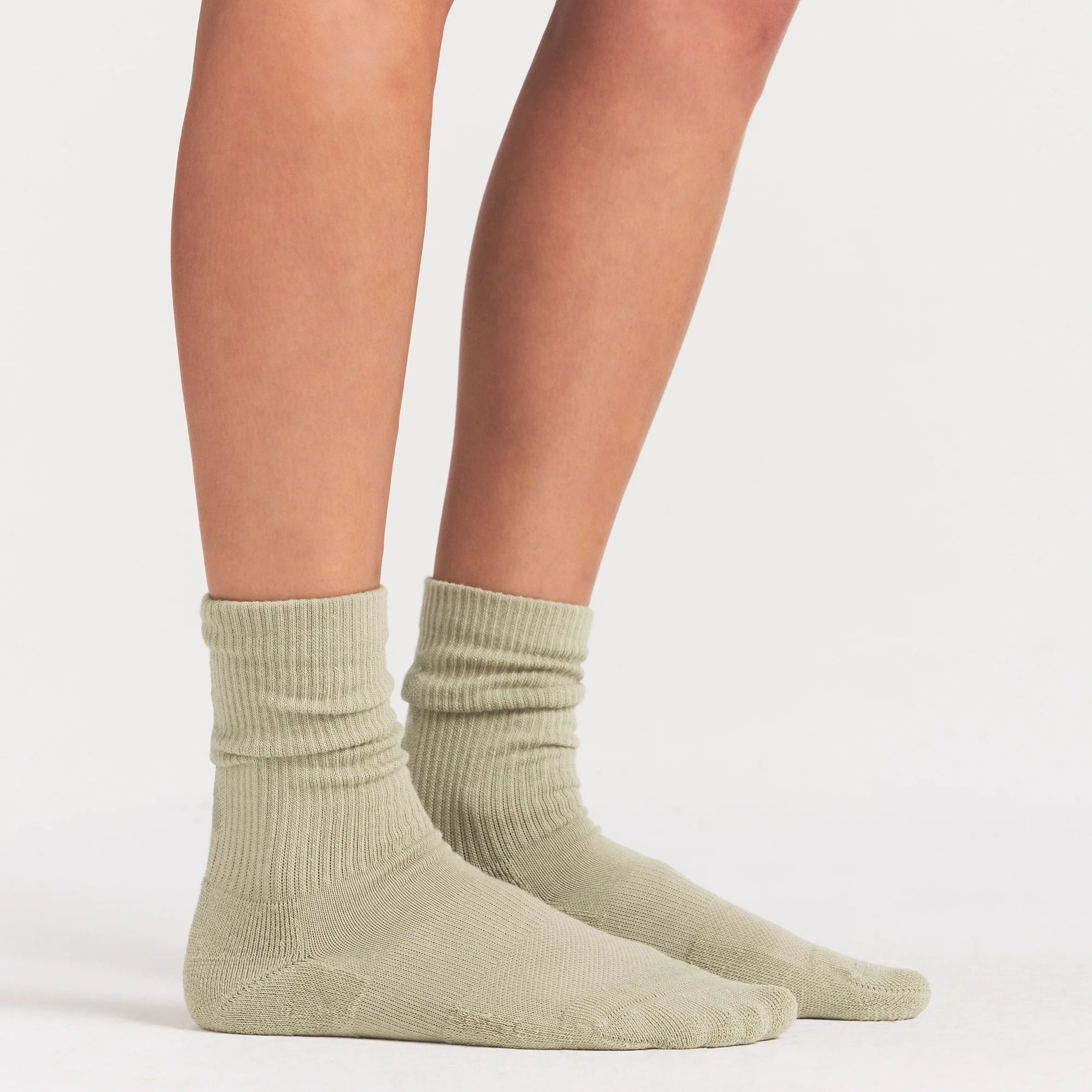 NikeSKIMS ACCESSORIES DRI-FIT™ CREW SOCK 3-PACK | DRIFTWOOD/TALC/BICYCLE YELLOW ON A MODEL SIDE VIEW