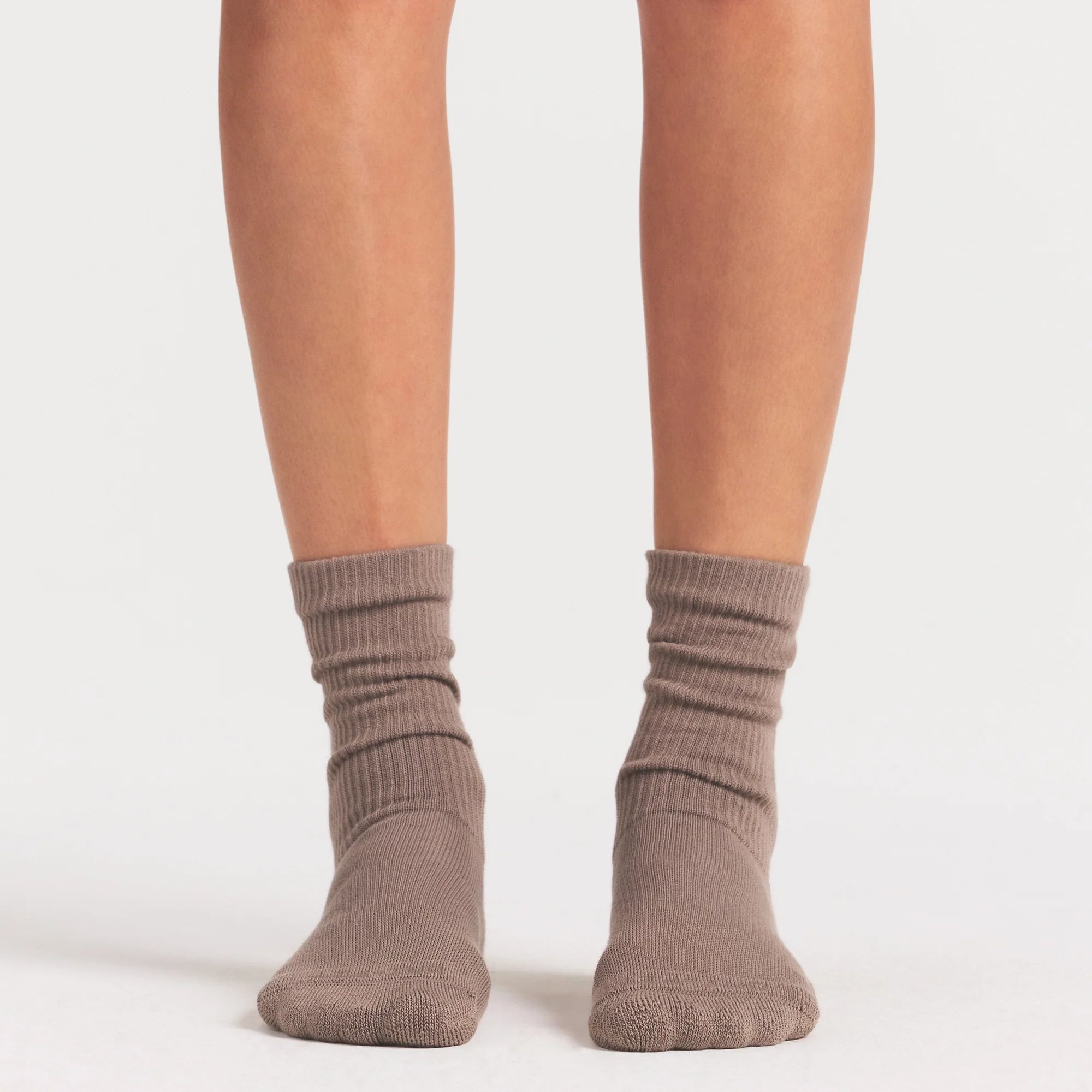 NikeSKIMS ACCESSORIES DRI-FIT™ CREW SOCK 3-PACK | DRIFTWOOD/TALC/BICYCLE YELLOW ON A MODEL SIDE VIEW