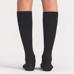 NikeSKIMS ACCESSORIES RIFT KNEE HIGH SOCK | OBSIDIAN/BOULDER ON A MODEL SIDE VIEW