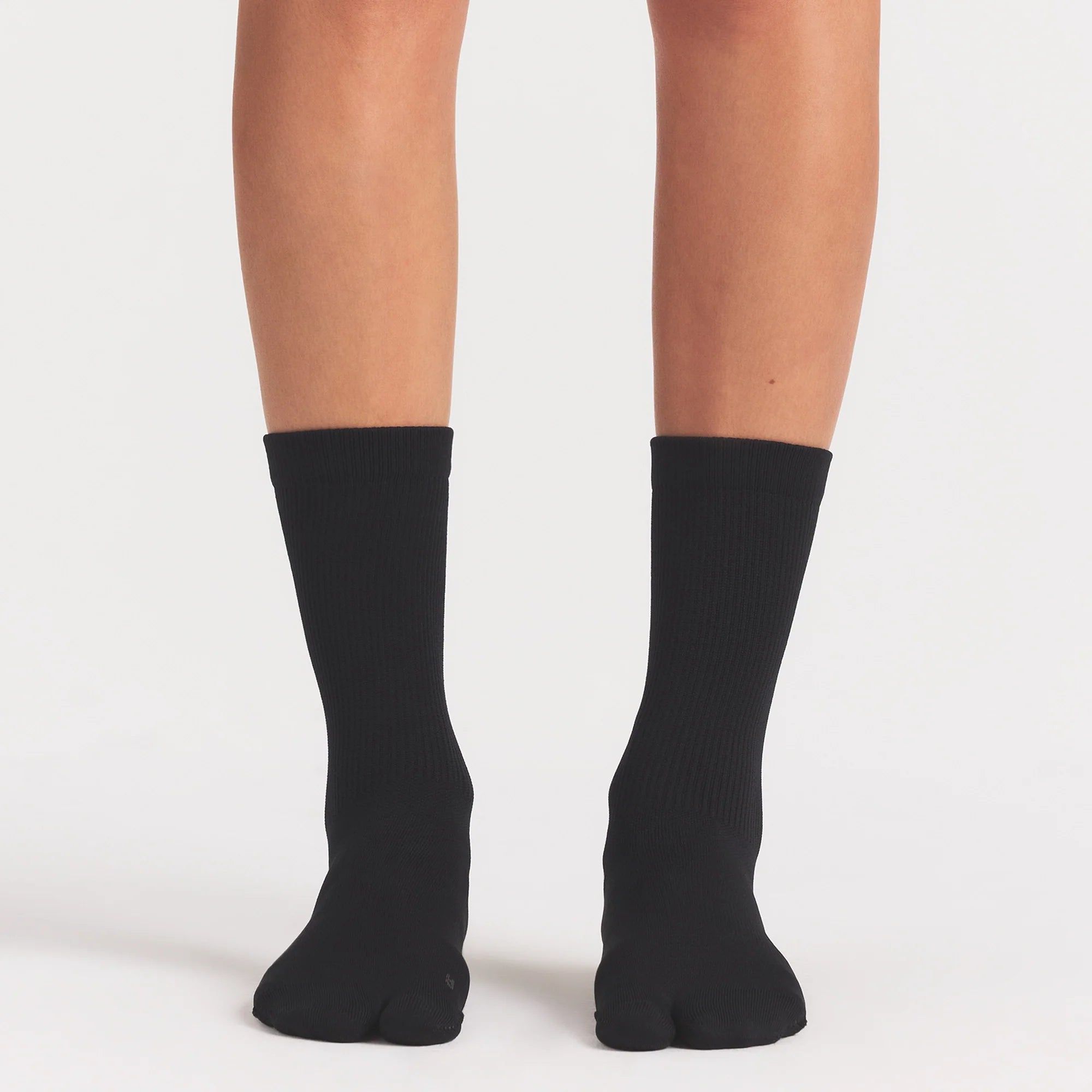 NikeSKIMS ACCESSORIES RIFT CREW SOCK | OBSIDIAN/(BOULDER) ON A MODEL SIDE VIEW @ | FOCUS: 0.0, 1.0, 0.9