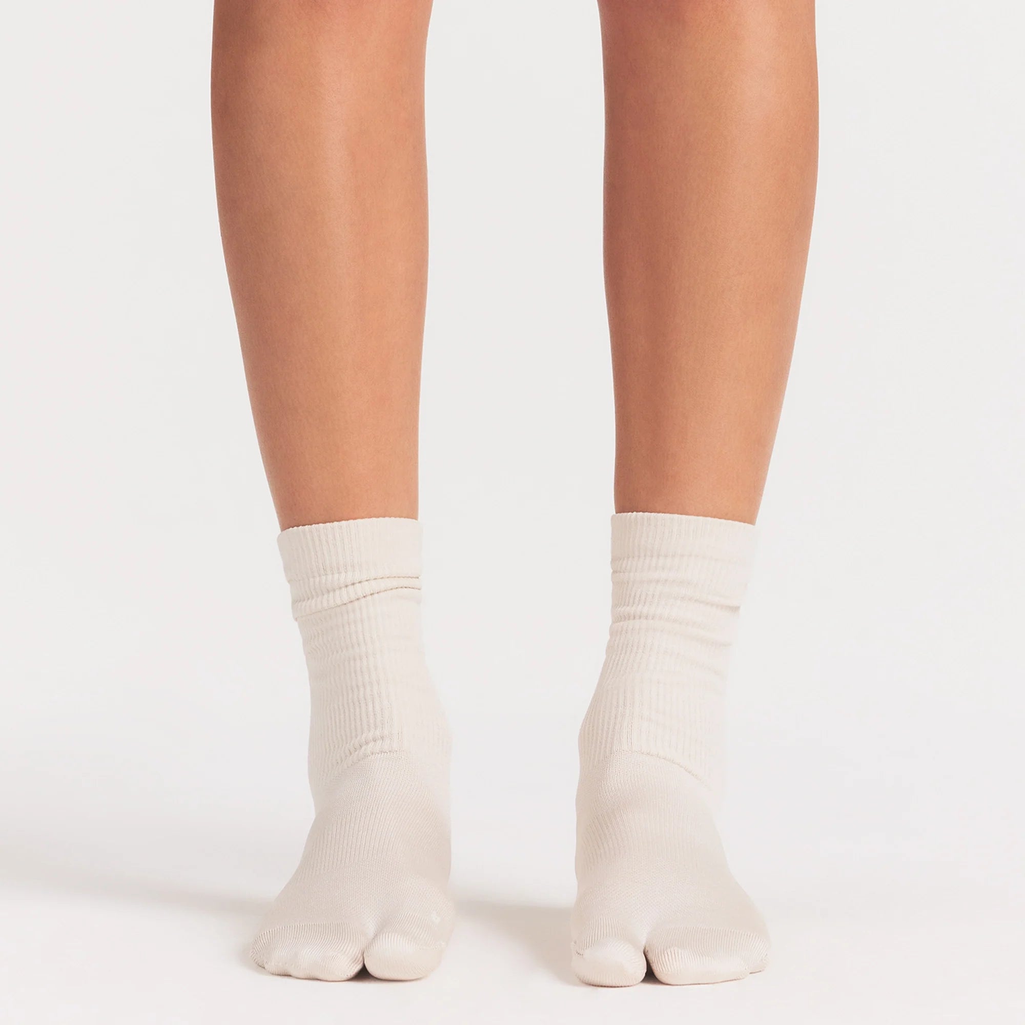 NikeSKIMS ACCESSORIES RIFT CREW SOCK | LIGHT OREWOOD BROWN ON A MODEL SIDE VIEW @ | FOCUS: 0.0, 1.0, 0.9