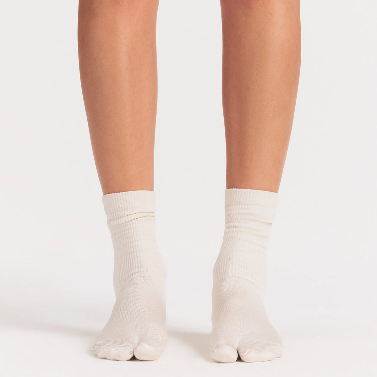 NikeSKIMS ACCESSORIES RIFT CREW SOCK | LIGHT OREWOOD BROWN ON A MODEL SIDE VIEW @ | FOCUS: 0.0, 1.0, 0.9