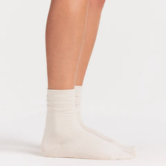 NikeSKIMS ACCESSORIES RIFT CREW SOCK | LIGHT OREWOOD BROWN ON A MODEL SIDE VIEW @ | FOCUS: 0.0, 1.0, 0.9