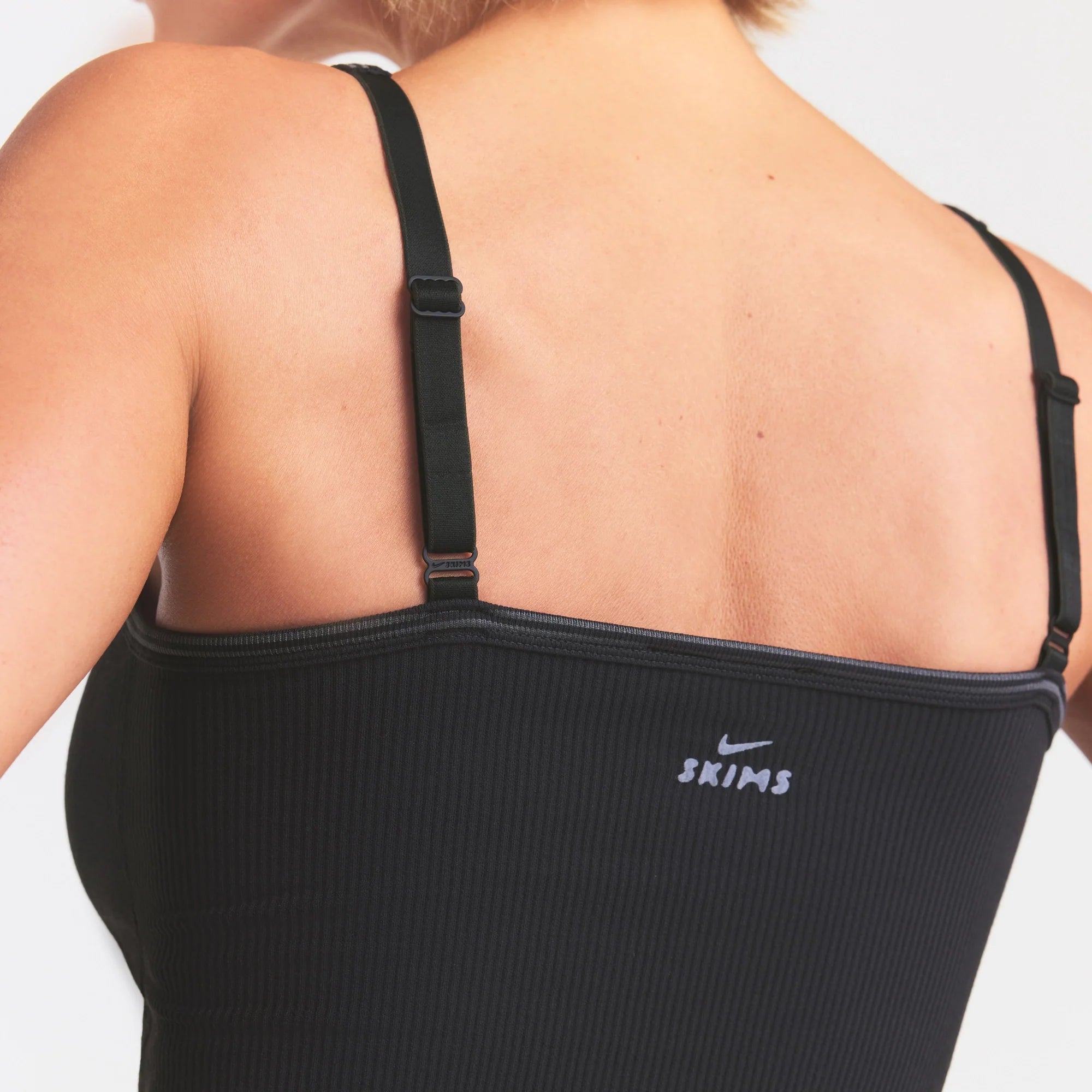 NikeSKIMS RIBBED SEAMLESS CAMI | OBSIDIAN & LAYS FLAT ON A WHITE BACKGROUND | FLT