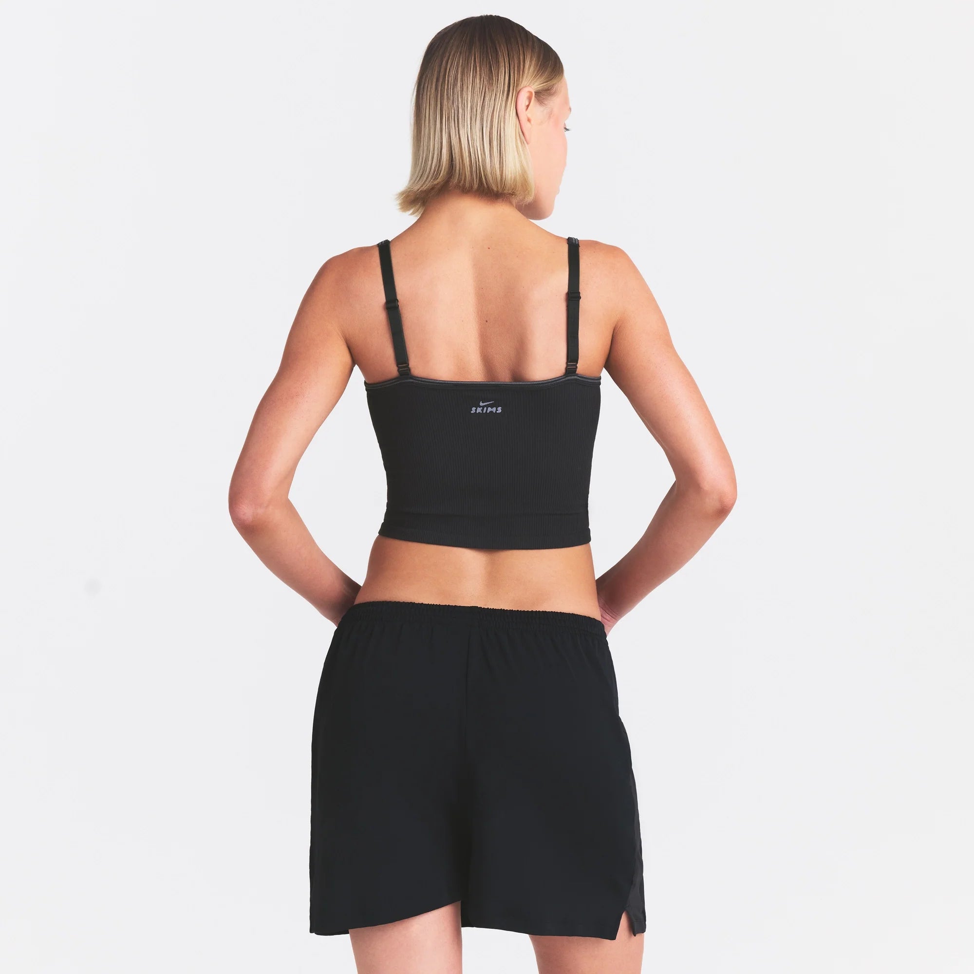 NikeSKIMS RIBBED SEAMLESS CAMI | OBSIDIAN & LAYS FLAT ON A WHITE BACKGROUND | FLT