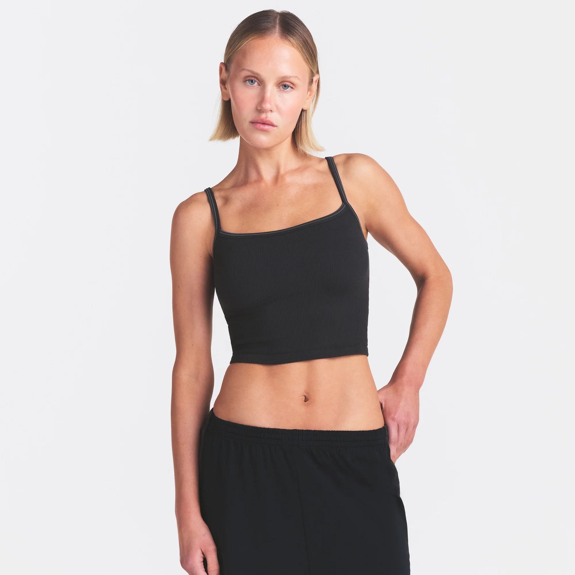 NikeSKIMS RIBBED SEAMLESS CAMI | OBSIDIAN & LAYS FLAT ON A WHITE BACKGROUND | FLT