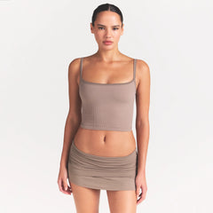 NikeSKIMS RIBBED SEAMLESS CAMI | DRIFTWOOD ON A MODEL SIDE VIEW @ | FOCUS: 0.0, 1.0, 0.9